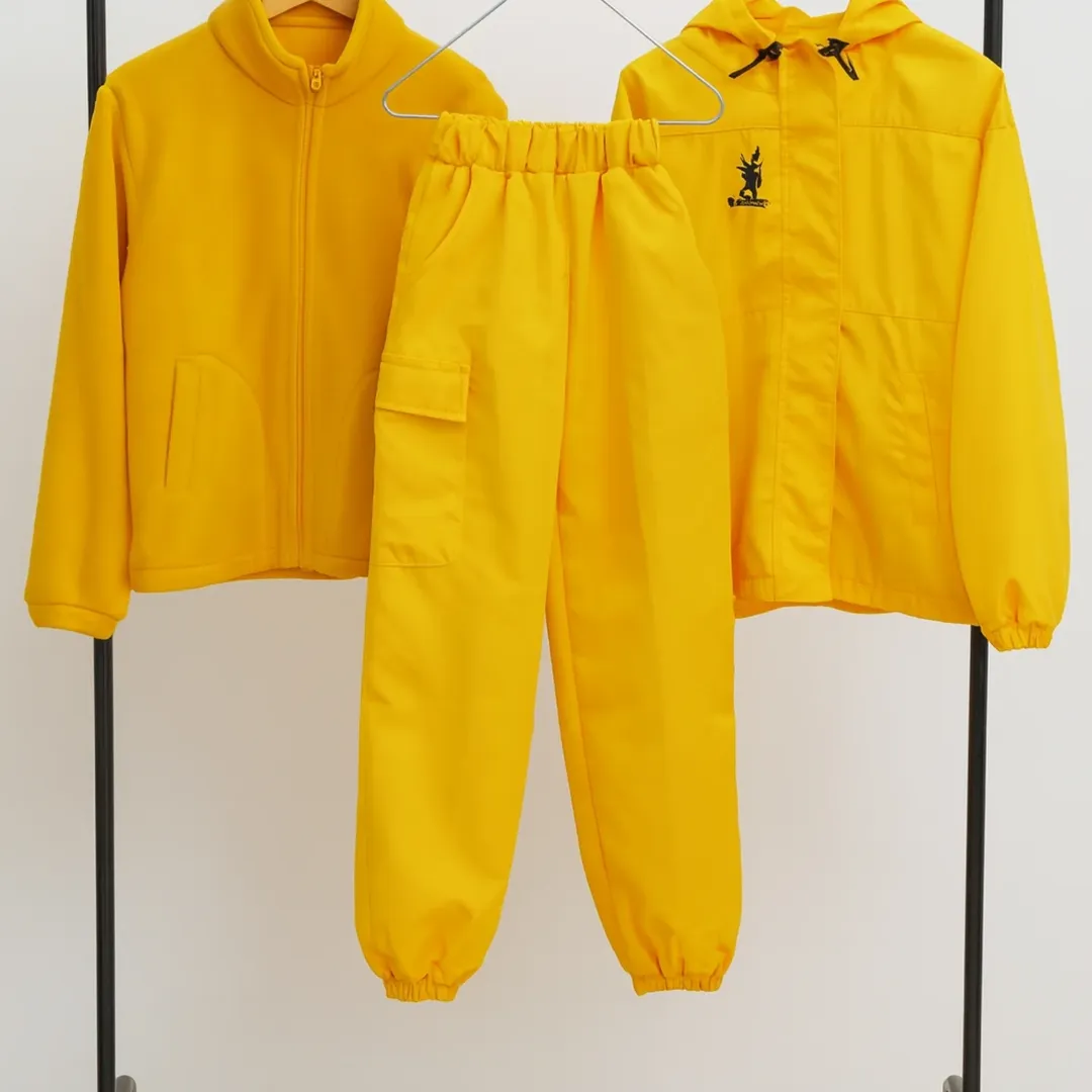 ست زمستونی بچه‌گانه شامل پلار گرم، شلوار جادار و بادگیر ضدباد